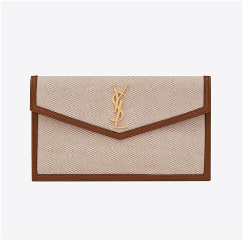 ysl clutch canvas|UPTOWN pouch in canvas and smooth leather .